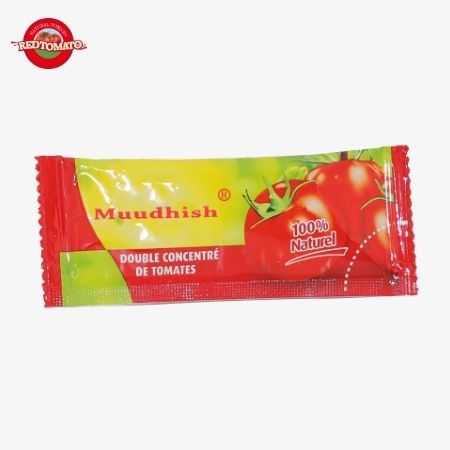 كيس من الكاتشب الحلو والحامض و 18 غرام من الطماطم الطبيعية النقية